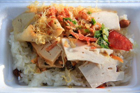 Xoi Man or Salty Sticky Rice topped with meats